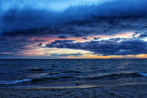 I think there's a dragon in the clouds. Pierport sunset over Lake Michigan by bioprof52,