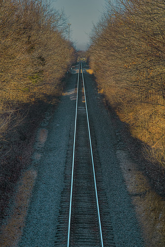 Birdseye View of Railroad Tracks at Dusk, railroad tracks railroadtracks bnsf transportation dusk goldenhour shadows vanishingpoint goreville illinois highdynamicrange photograph outdoors