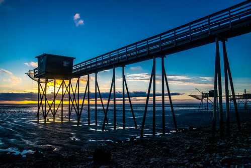 High walk by Tony Shertila, esnandes france nouvelleaquitaine beach chinesefishingnets clouds coast europe fishing sky structure