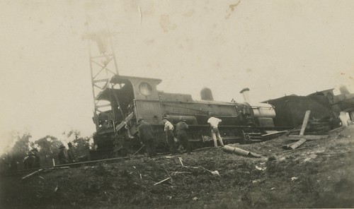 Men inspecting two derailed engines following a railway accident, Wallangarra, Queensland by State Library of Queensland, Australia, <strong>Creator: </strong> Unidentified.

<strong>Location:</strong> Wallangarra, Queensland. 

<str