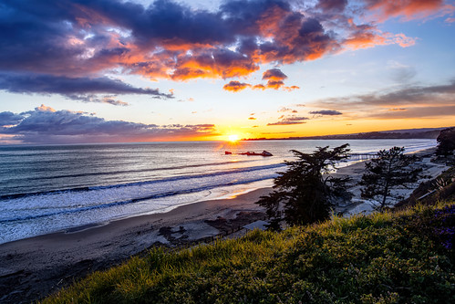 Aptos Pier at Sunset by punahou77, At one time, the cement boat that you see in the picture was a floating casino. It was abandoned and