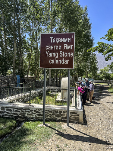 Langar to Ishkashim-42 by Randy & Ellen, The calendar stone is a large stone with a series of holes.  You look through a special view stone a