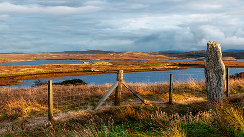 Loch Gealava from The Callanish Stones. by Nikon Caz, The landscape was set aglow by the setting sun so with the sky, the stones, the abandoned croft and 