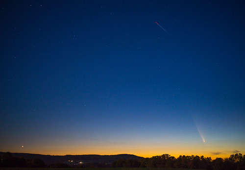 Comet Tsuchinshan-ATLAS by lookseeseen, Venus left -and plane trailtsuchinshanatlas comet astronomy sunset
