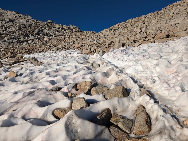 Looking back up at Forester Pass, showing the route through the mostly-melted snow