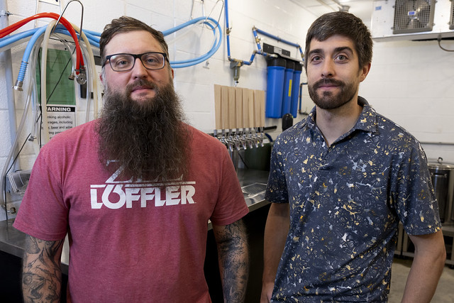 Christian Schubert and Scott Lafontaine in the UA brewing lab.