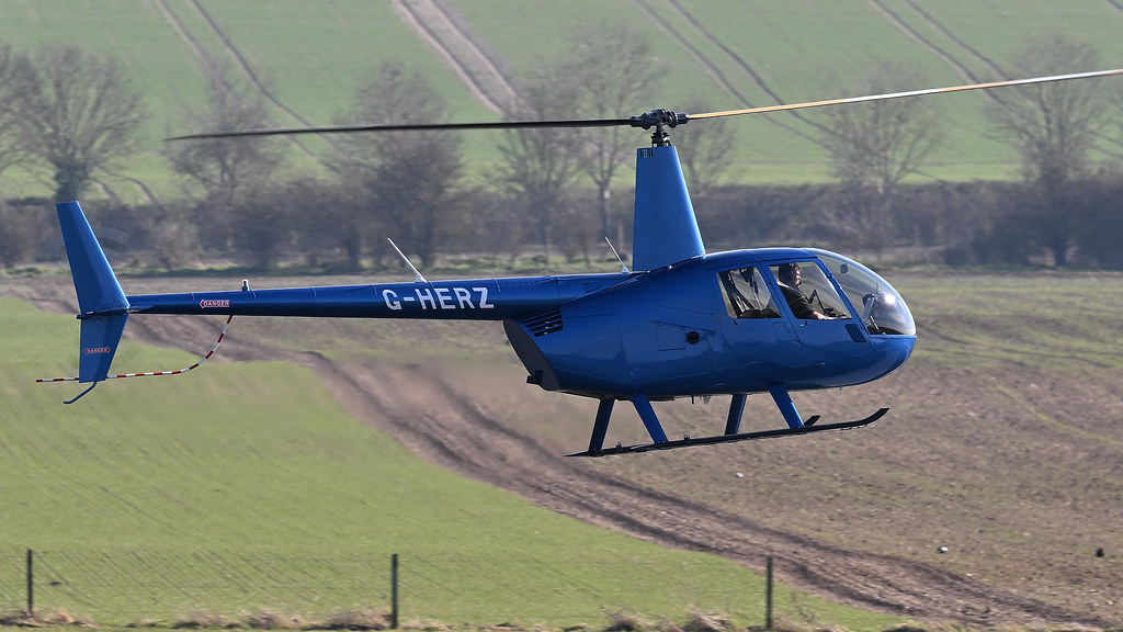 Robinson R4 1997 Robinson R44 Astro helicopter G-HERZ | 1997 Robinson R4… | Flickr