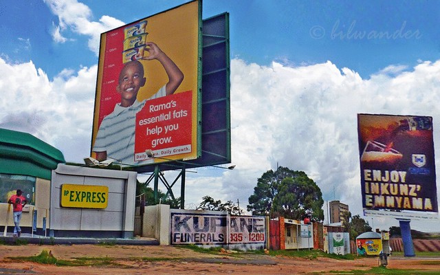 South Africa. Soweto, billboard ads mis-communication (animated inside)