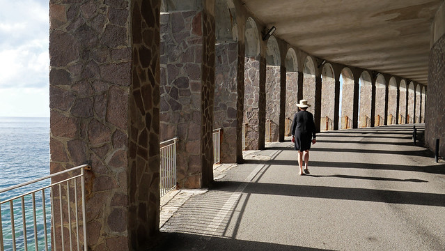 Under the arcades, by the sea