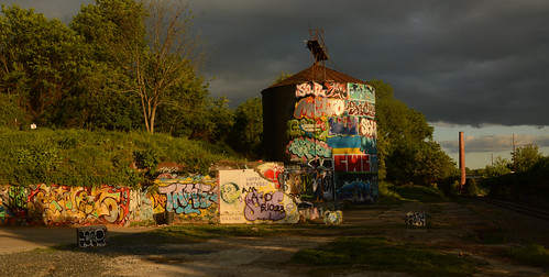 Near the railroad tracks at sunset by radargeek, The River Arts District of Asheville, NC almost a year after the floods in 2024 due to Hurricane Hel