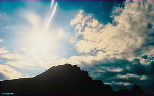 Flickr photo: sun & mountain