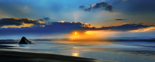 Solitary Rock Amidst the Misty Sunrise Waves by Ted Holm Photography, seascape beach rock ocean coast landscapesunrise dawn goldenhour sunsetmisty foggy clouds atmospheri