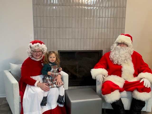 Ivy with Santa and Mrs Clause
