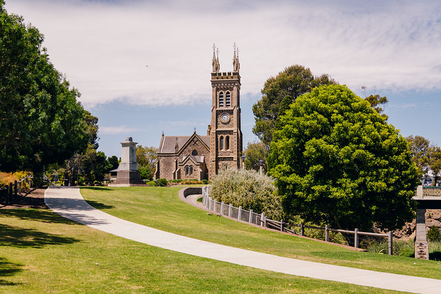Gothic stone church with clock tower