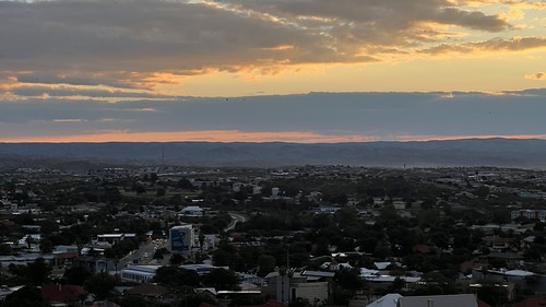 A panoramic view of the city of Windhoek, the capital of Namibia, at sunset. by antonioqueiros,