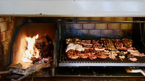 Traditional Asado Grilling Over Open Wood Flames in Río Gallegos Santa Cruz Argentina