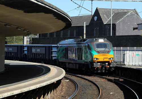68 007 '30 years of DRS' creeps through carnforth station with 4C15  Drigg BNF to Shap Summit Quarry 24.04.2026