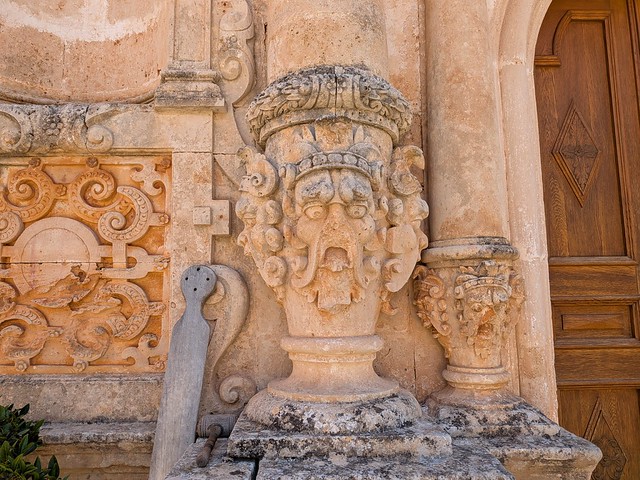 Semantron Drum (left) and Faces at the Orthodox Gouverneto Monastery - Chania, Crete, Greece