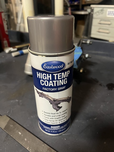 Spray can of Eastwood High Temp Coating in Factory Gray, designed to resist heat up to 1400°F for automotive use.