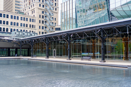 Modern Glass Building and Reflecting Pool | by f.flibotte