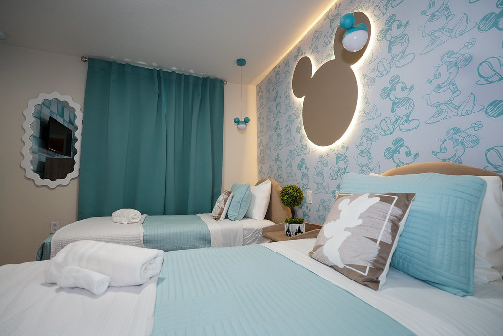 Twin bedroom with mouse-ears wall feature at 607 Jasmine Lane
