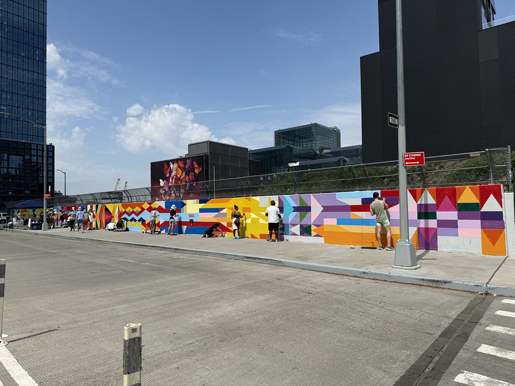 Street-level view of the finished mural on Hudson Boulevard West.