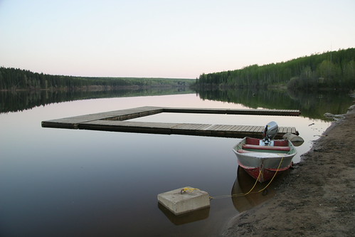 Dock and boat at Rainbow Lake Provincial Recreation Area