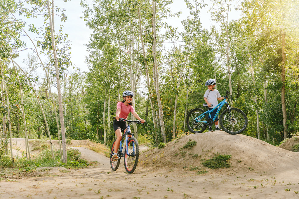 Children biking at the bike park at Cypress Hills Provincial Park