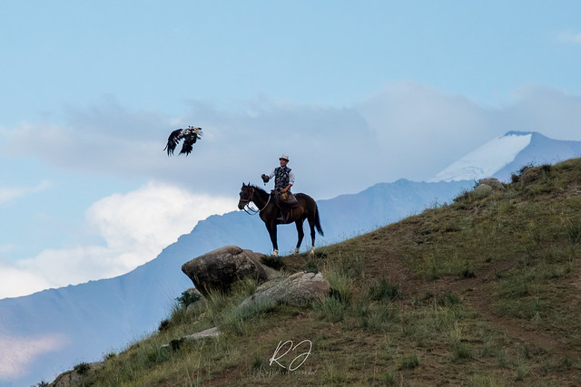 eagle hunter and eagle, August