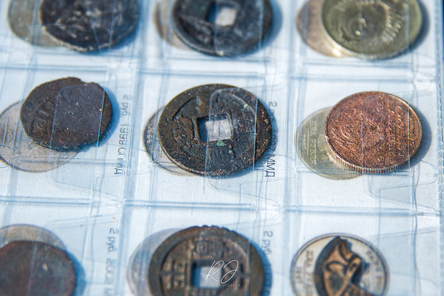 coins in sleeves, August