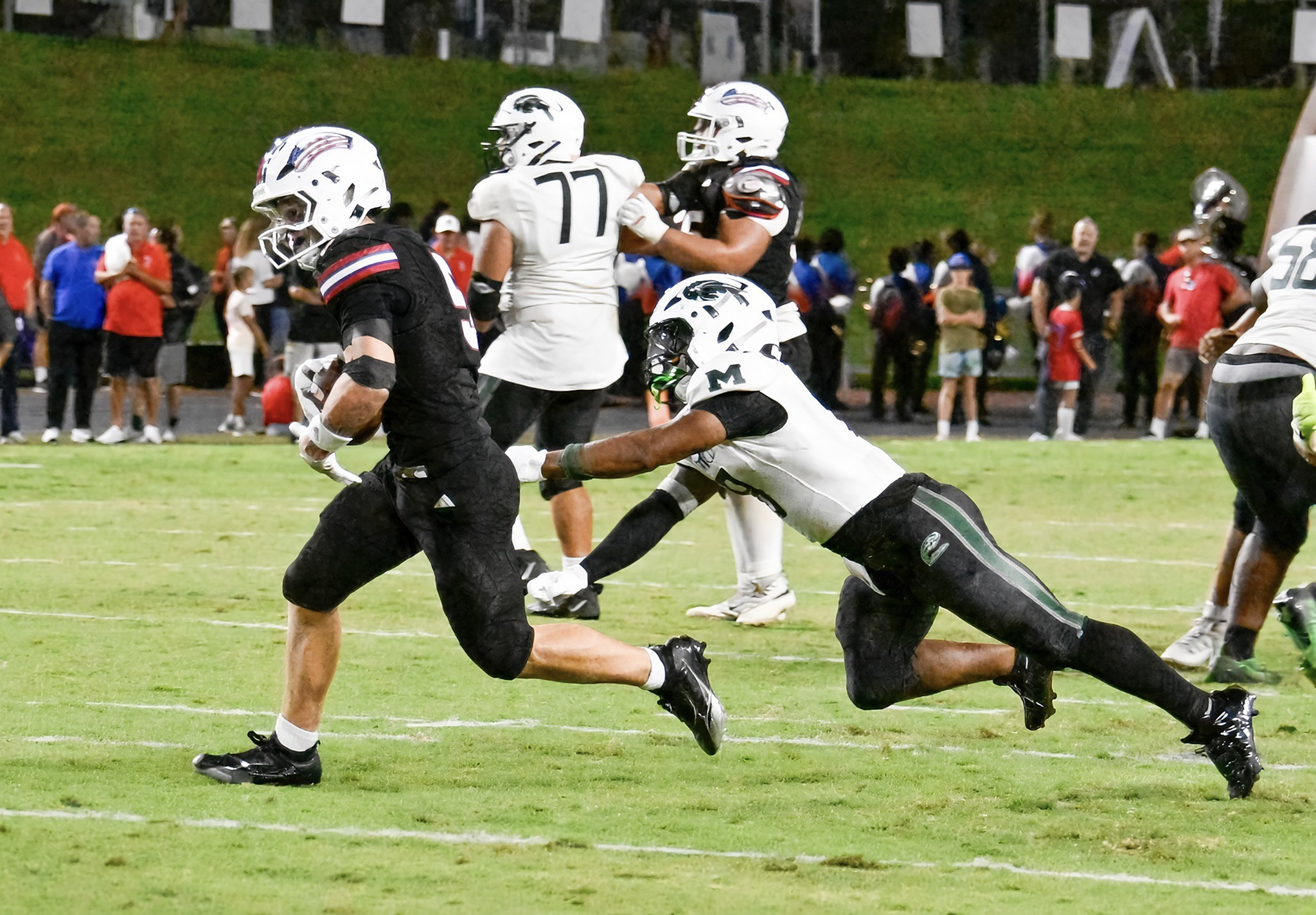 Gannon Sever runs through the tackler on his way to another TD