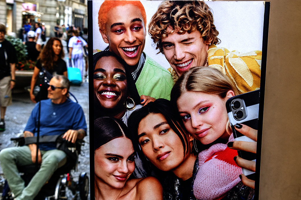 Ad showing people of different races taking a selfie on 9-11-26--Florence copy