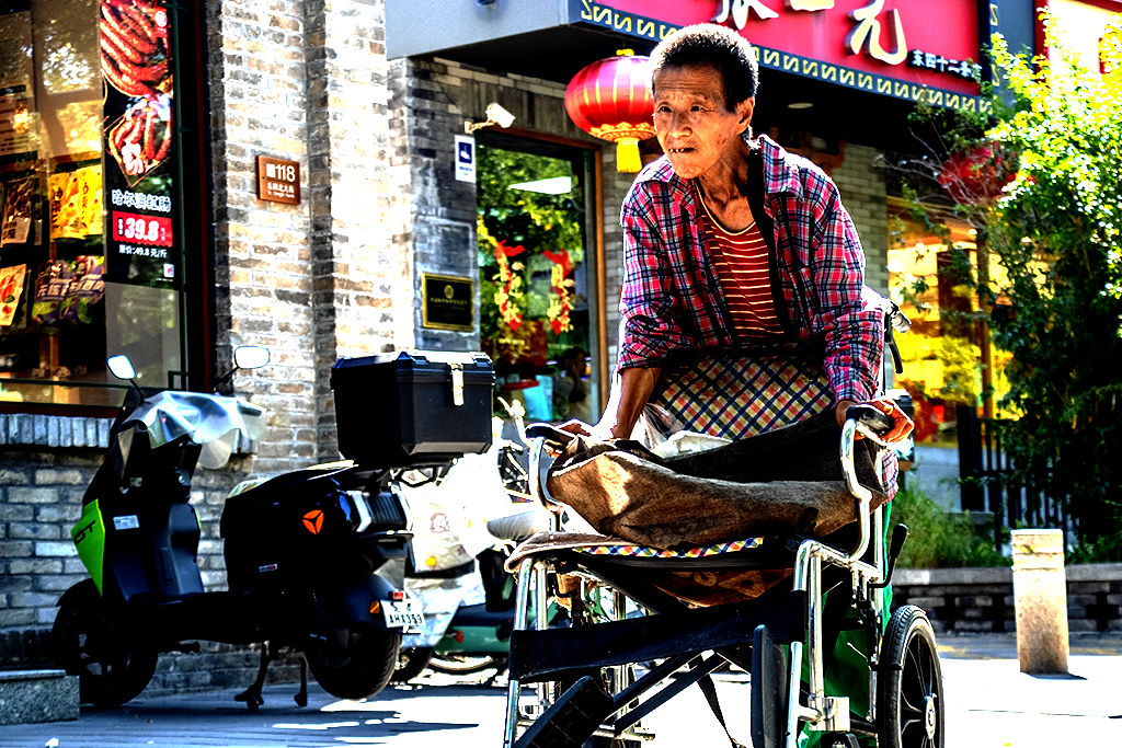 Very old woman pushing wheelchair on 9-15-26--Beijing copy