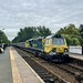 Powerhaul 70xxx pounding through romiley on a stone freight