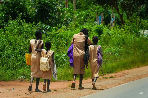 Women walking outside Abomey