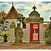 Entryway flanked by two statues, Temple of the Reclining Buddha, Bangkok, July 26, 2026