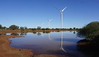Windfarm water reflection in the evening