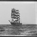 Unidentified three-masted sailing ship at sea