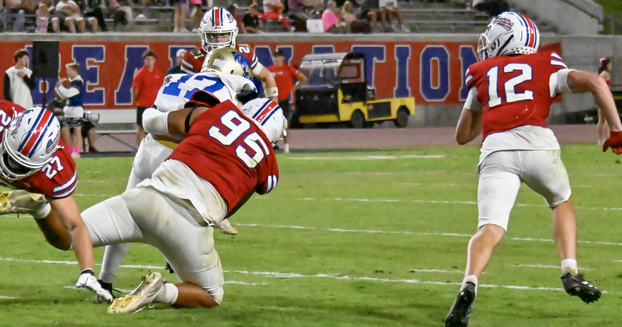 Thomas Kelly engulfs the running back on the tackle