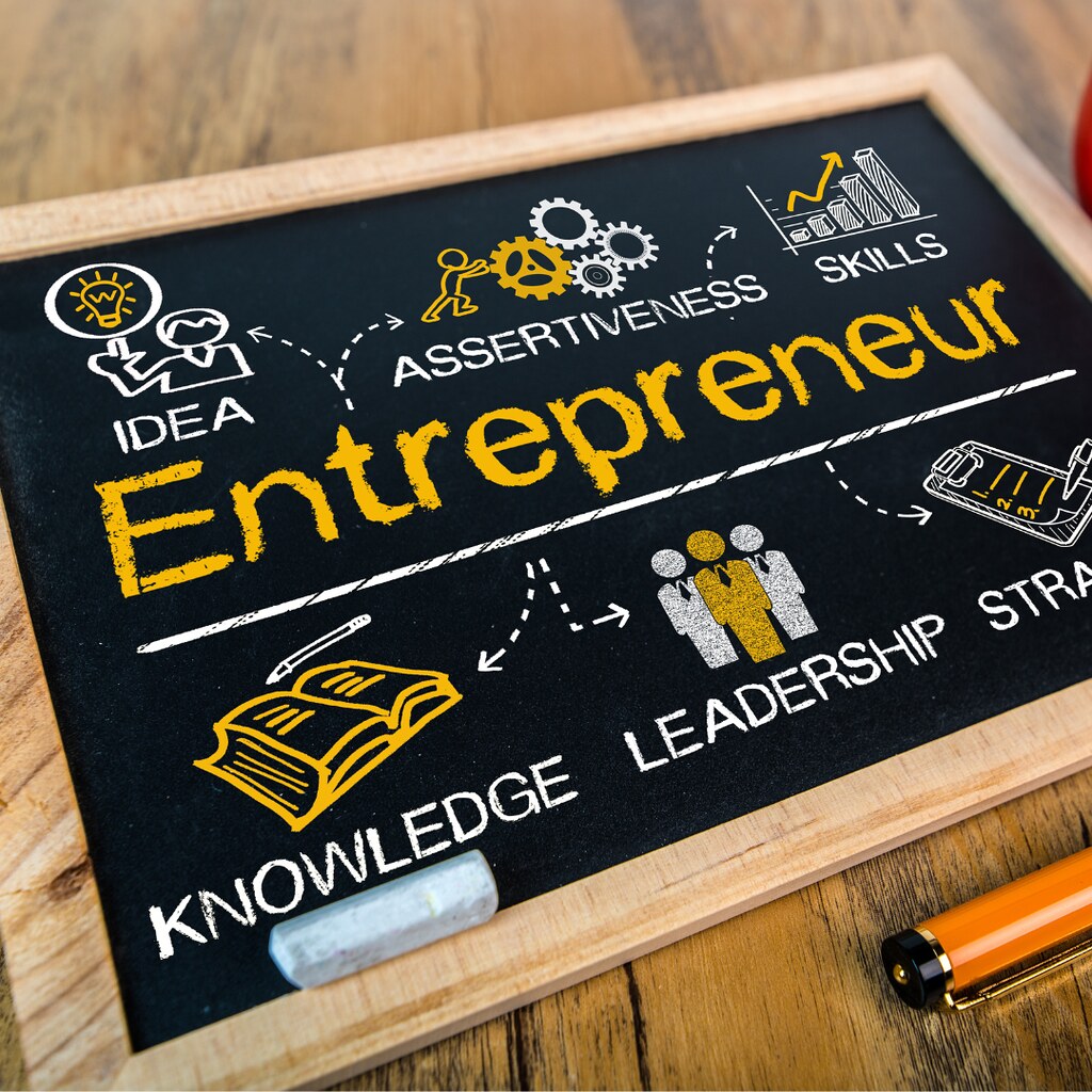 blackboard with entrepreneur written in the middle