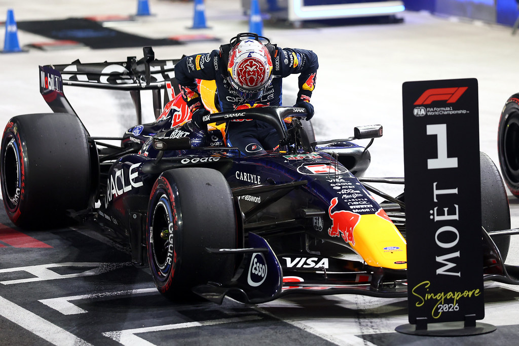 SINGAPORE, SINGAPORE - OCTOBER 10: Pole position qualifier Max Verstappen of the Netherlands and Oracle Red Bull Racing arrives in parc ferme during qualifying ahead of the F1 Grand Prix of Singapore at Marina Bay Street Circuit on October 10, 2026 in Singapore, Singapore. (Photo by Andy Hone/LAT Images) // Getty Images / Red Bull Content Pool // SI202610100446 // Usage for editorial use only //
