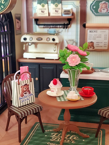 Rolife's Little Bear Cafe.  Lots of cute little details.  I swapped out the cute patterned paper they wanted stuck in a roll for the bag, with some pink miniverse tissue.  That way I can use the patterned sticker paper for a menu or something.