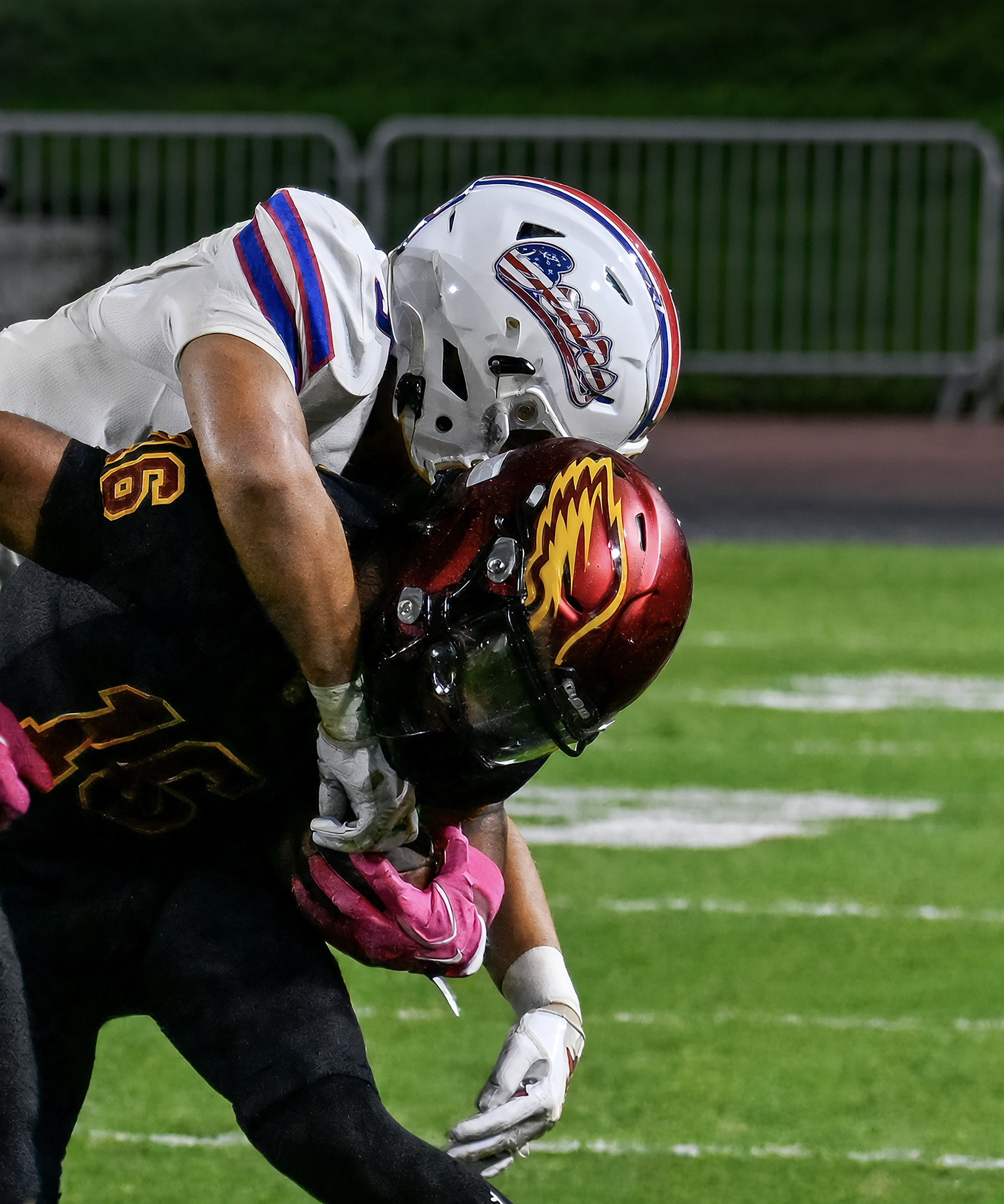 Grant Moser tackles the ball carrier from behind