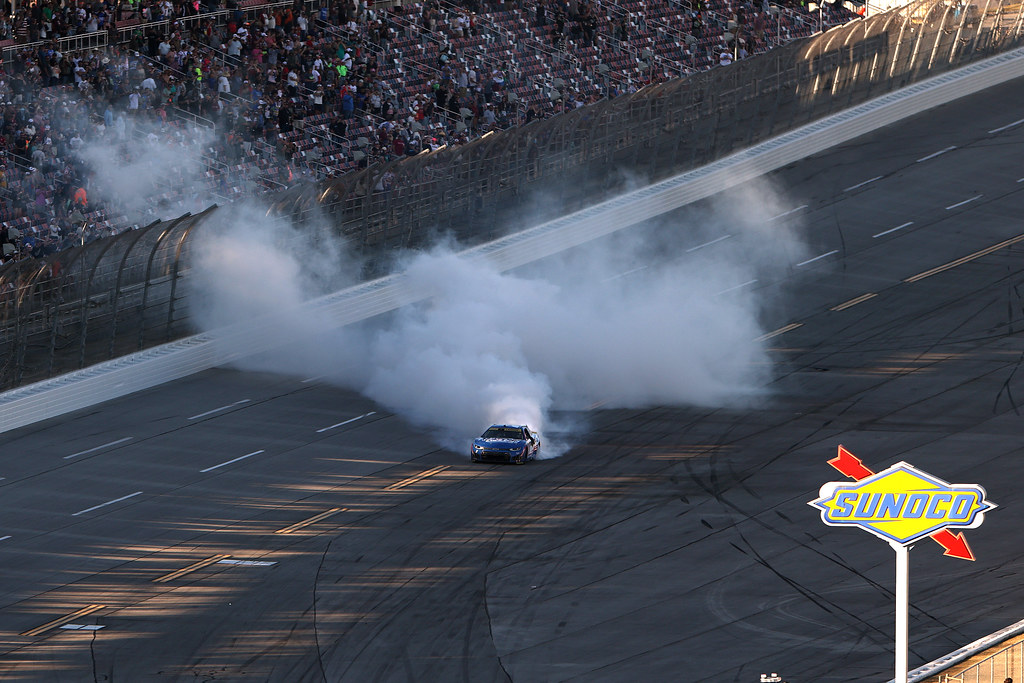 TALLADEGA, ALABAMA - OCTOBER 25: Kyle Larson, driver of the #5 HendrickCars.com Chevrolet, celebrates with a burnout after winning during the NASCAR Cup Series YellaWood 500 at Talladega Superspeedway on October 25, 2026 in Talladega, Alabama. (Photo by Scott Taetsch/Getty Images)