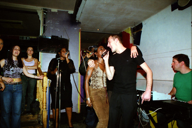Charming Lady in Animal Skin Print Top and Brown Suede Leather Trousers at Singers Open Microphone with Asha on Keyboard The Spot Maiden Lane Covent Garden London West End September 2001 097