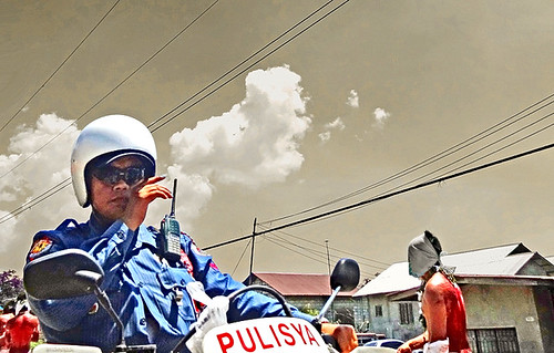 Philippines. San Fernando city, pulisya motorcyclist along the calvary path by bilwander,  <b> <a href="https://www.flickr.com/photos/bilwander/albums/72157633398893138"> San Fernando / Blac