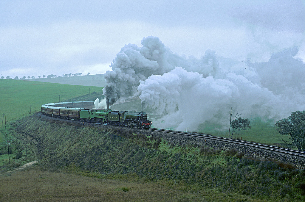 "Night Mail to Dubbo". LNER Class A3 4472, The Flying Scotsman, and 3801 stagger up Tumulla Bank, Main West, NSW, 10th June, 1989.