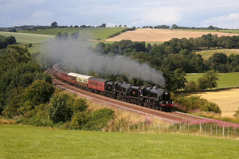 Returning south, the '15 Guinea Fellsman' is seen near Armathwaite passing Low Baron Wood Farm by a pretty sizeable gallery for this location compared to recent years.

Published in Railway Herald 'Steam 68' supplement to issue 373.