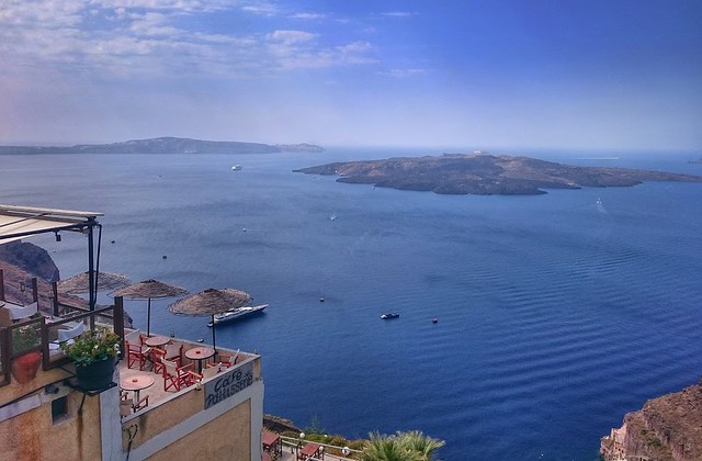 Panoramic view of Fira and volcano on the island of Thera