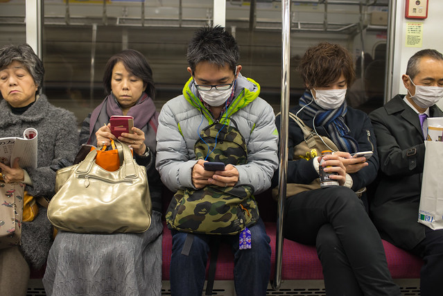 Masks and Phones on the Subway